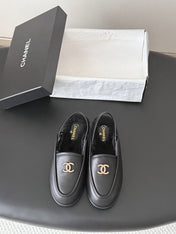 CHANEL 26S SLINGBACK LOAFERS IN BLACK CALFSKIN AND SHEARLING LINING