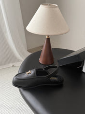 CHANEL 26S SLINGBACK LOAFERS IN BLACK CALFSKIN AND SHEARLING LINING
