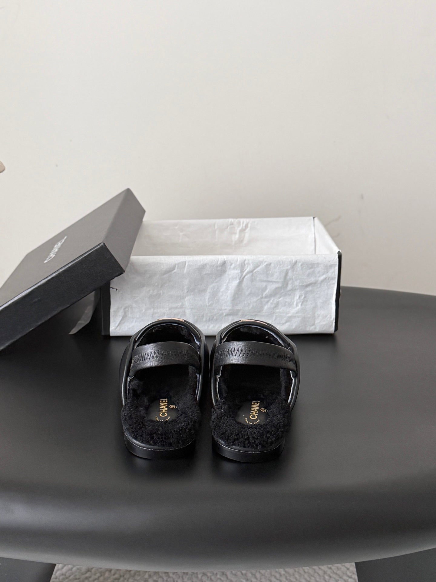 CHANEL 26S SLINGBACK LOAFERS IN BLACK CALFSKIN AND SHEARLING LINING