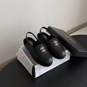 CHANEL 26S SLINGBACK LOAFERS IN BLACK CALFSKIN AND SHEARLING LINING