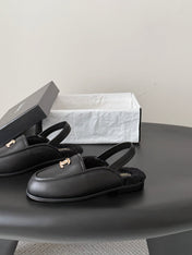 CHANEL 26S SLINGBACK LOAFERS IN BLACK CALFSKIN AND SHEARLING LINING