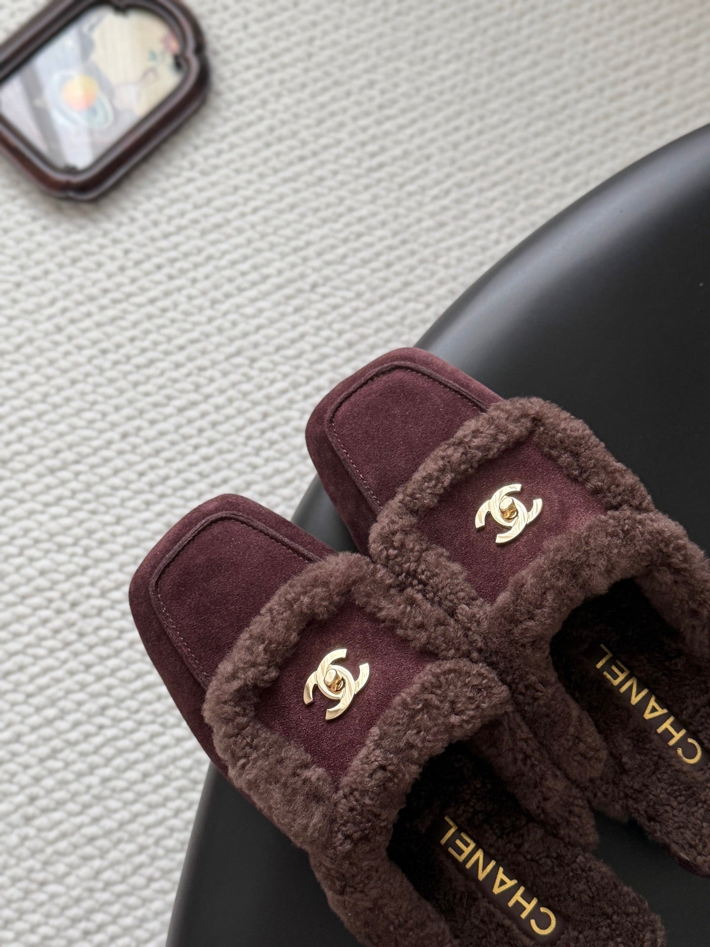 CHANEL 26S MULES IN BURGUNDY SHEARLING AND SUEDE