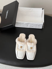 CHANEL 26S MULES IN WHITE SHEARLING AND CALFSKIN