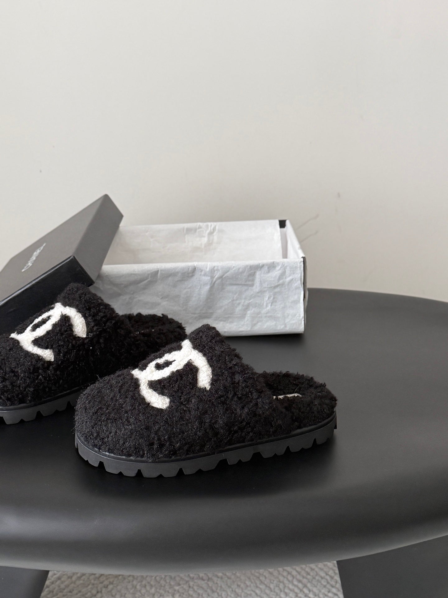 CHANEL 26S SLIDE SANDALS IN BLACK SHEARLING UPPER AND LINING WITH WHITE CC LOGO