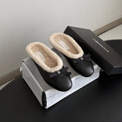 CHANEL 26S MULES IN BLACK LAMBSKIN AND SHEARLING