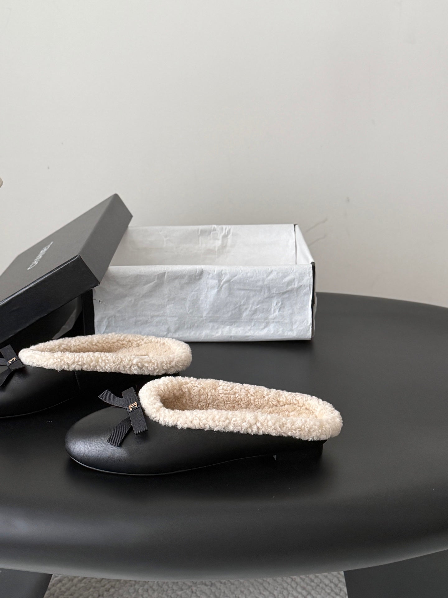 CHANEL 26S MULES IN BLACK LAMBSKIN AND SHEARLING