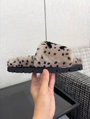 CHANEL 26S PLATFORM SLIDE SANDALS IN GRAY AND BLACK SHEARLING DALMATIAN PRINT
