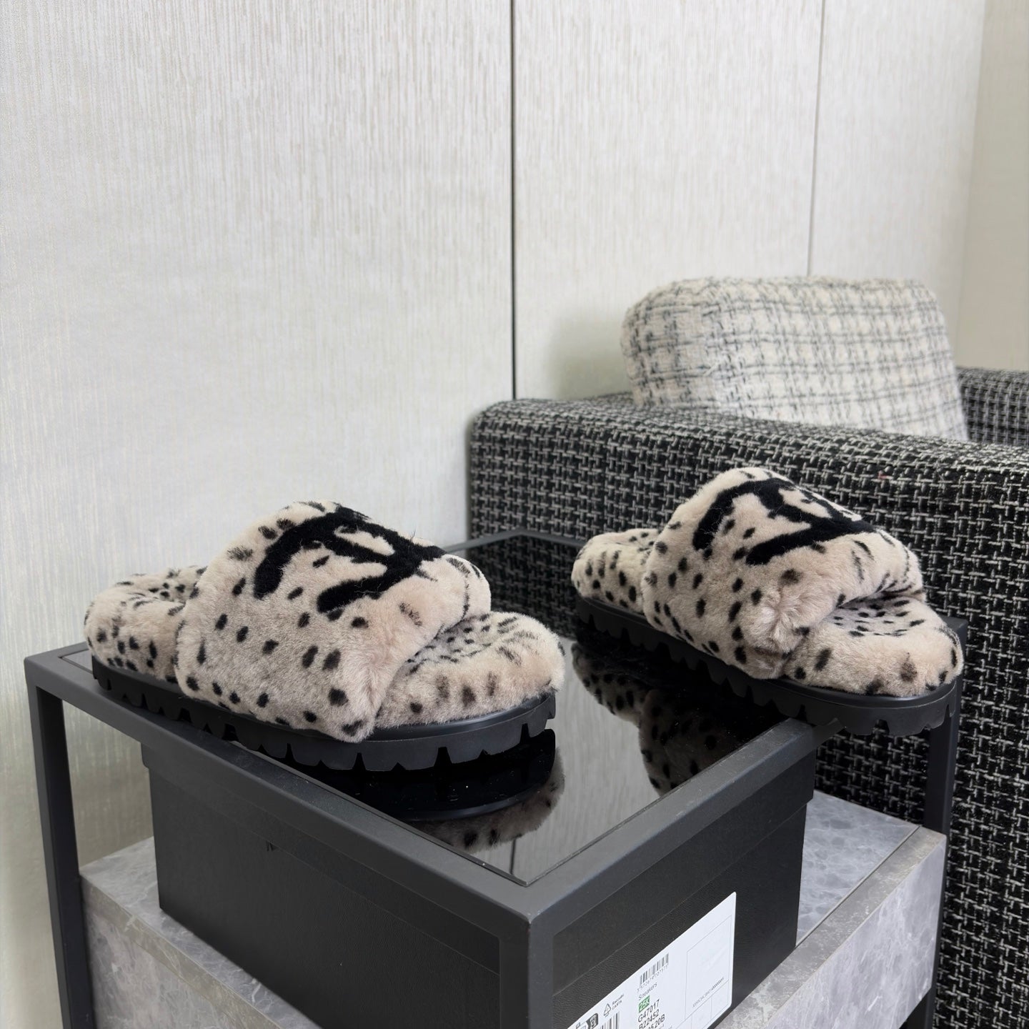 CHANEL 26S PLATFORM SLIDE SANDALS IN GRAY AND BLACK SHEARLING DALMATIAN PRINT