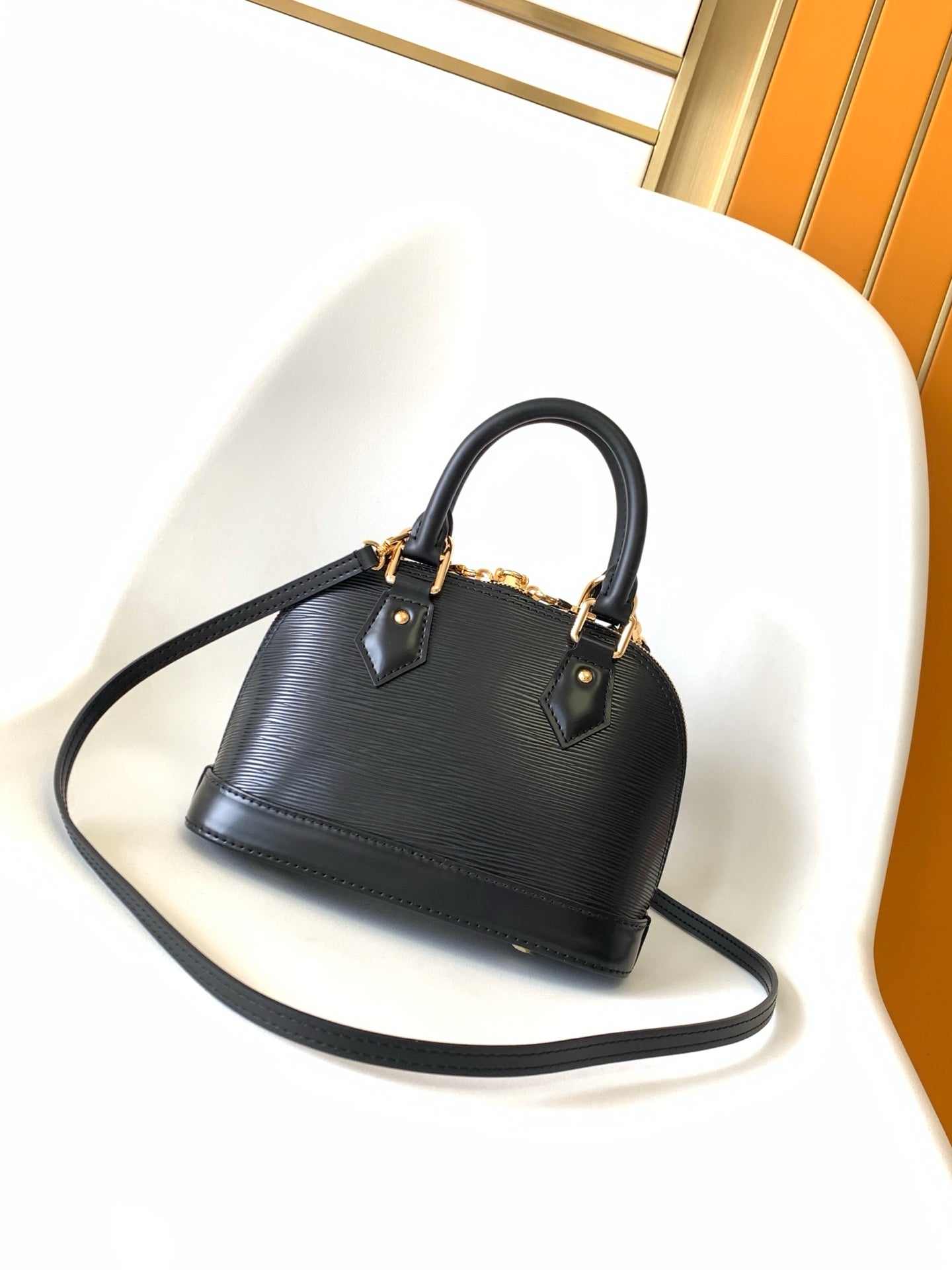 LV 25S ALMA BB BAG 23 IN BLACK EPI CALFSKIN GOLD HARDWARE