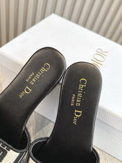 DIOR FLAT SLIDES 25S IN BLACK CALFSKIN AND FABRIC BRAND NAME EMBROIDERY
