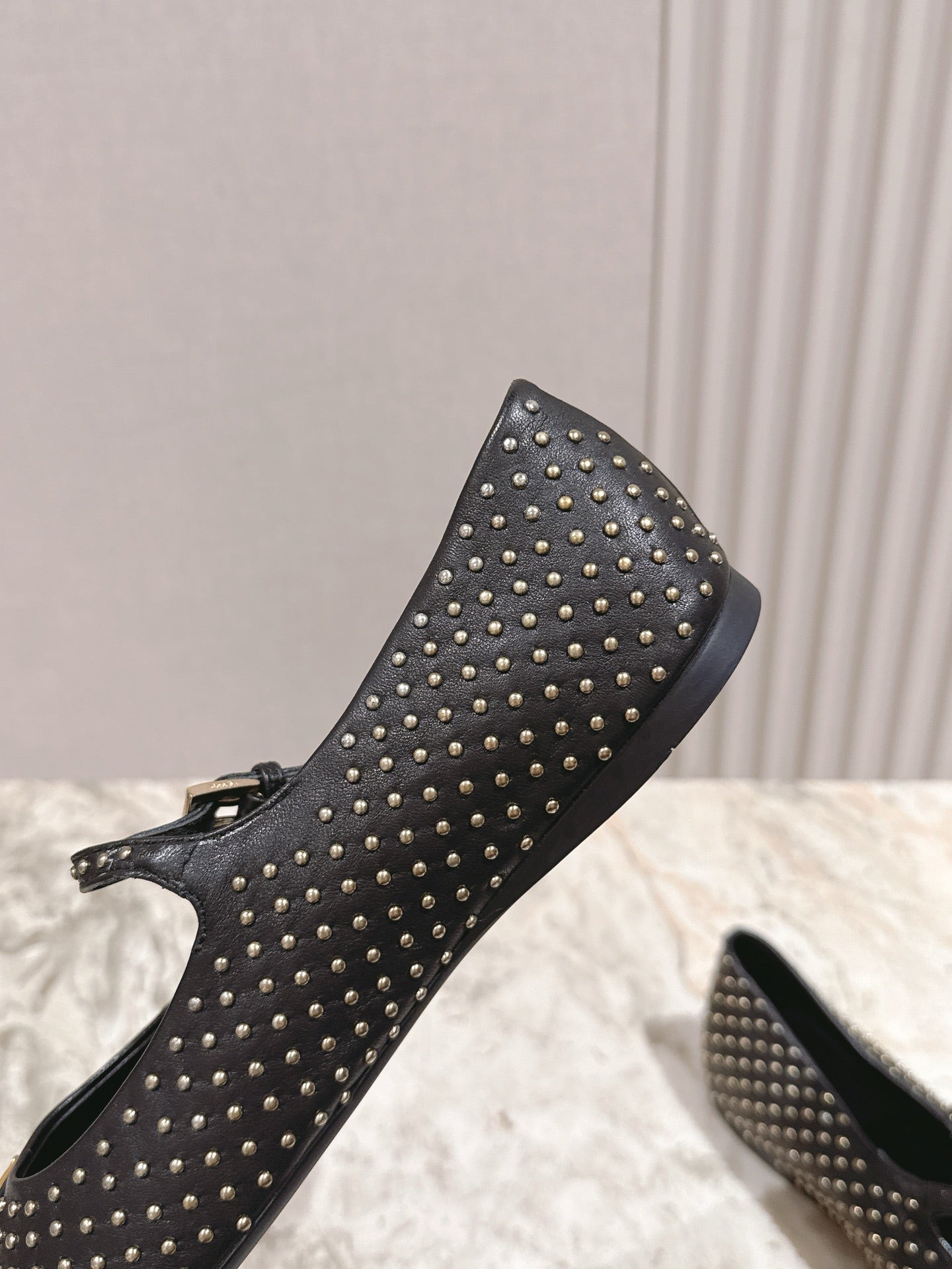 PRADA 25S STUD EMBELLISHED BALLERINA IN BLACK CALFSKIN
