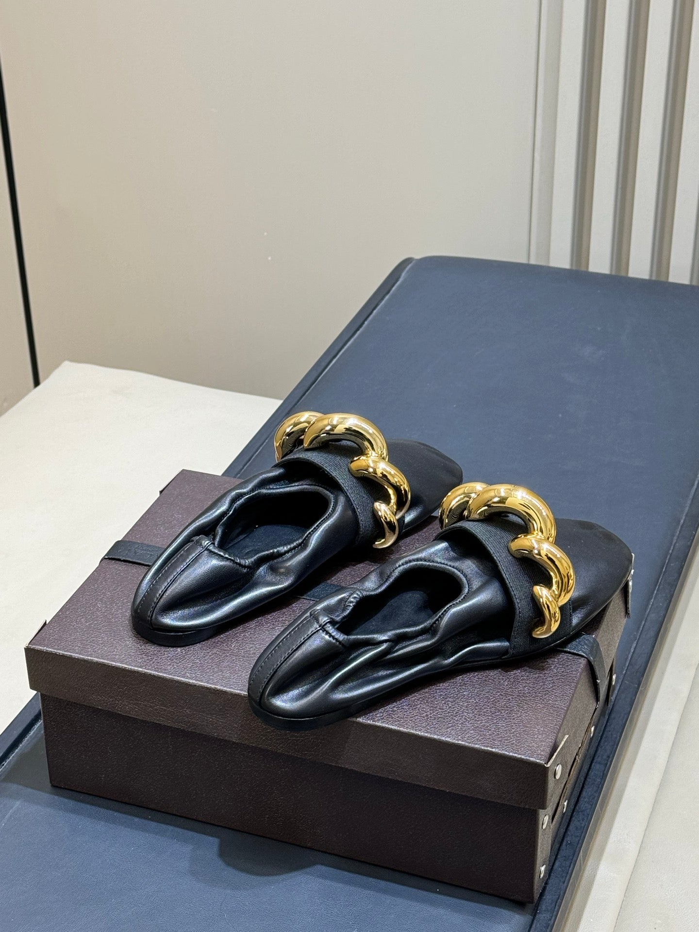 ALAIA 26S KNIT BALLET FLATS IN BLACK LAMBSKIN WITH GOLD HARDWARE