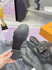 LV 26S FLAT SLIDE SANDALS IN BLACK EMBOSSED CALFSKIN GOLD HARDWARE