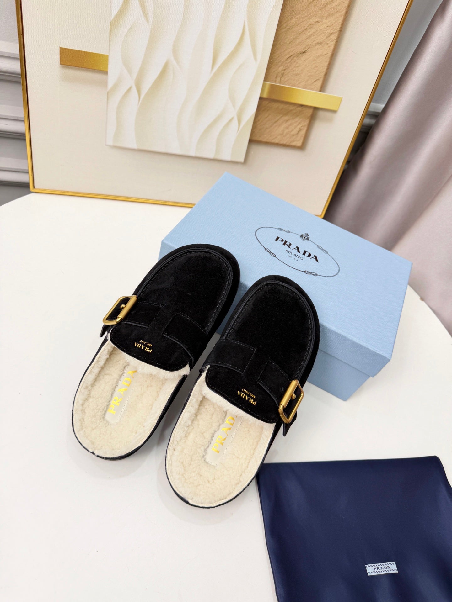 PRADA 26S SHEARLING-LINED MULES IN BLACK SUEDE