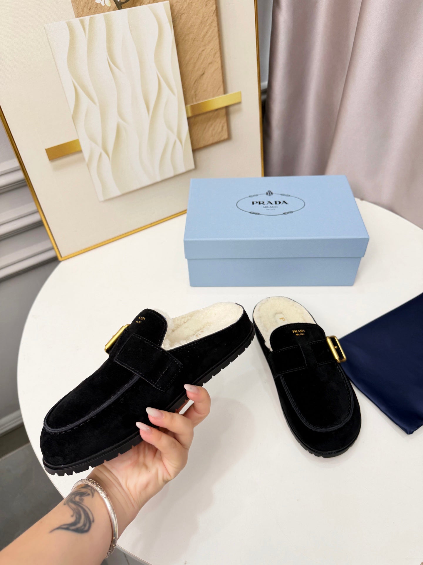 PRADA 26S SHEARLING-LINED MULES IN BLACK SUEDE