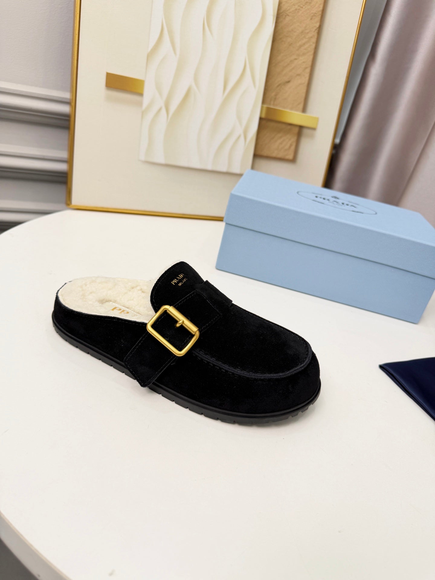 PRADA 26S SHEARLING-LINED MULES IN BLACK SUEDE