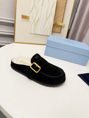 PRADA 26S SHEARLING-LINED MULES IN BLACK SUEDE
