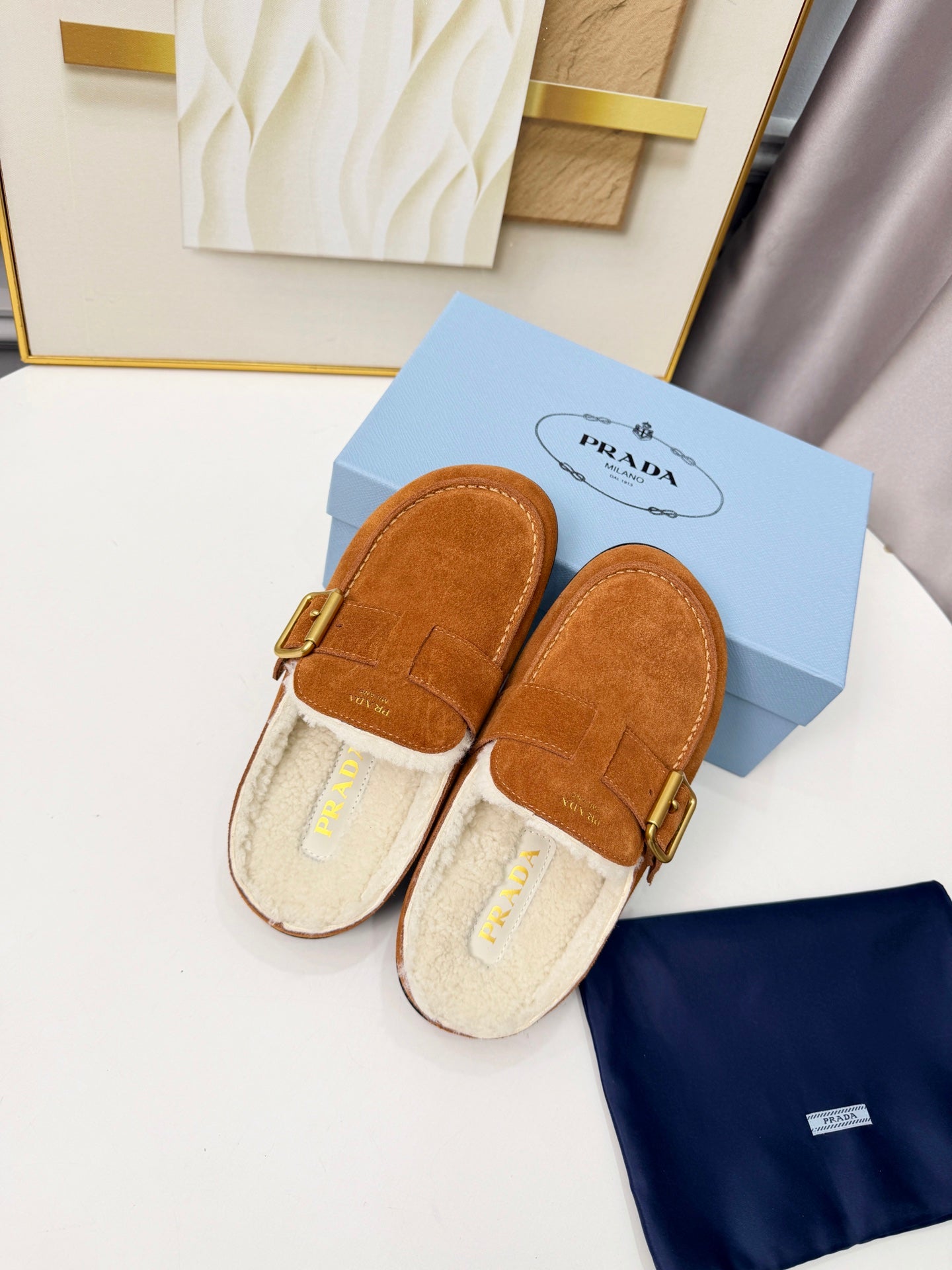 PRADA 26S SHEARLING-LINED MULES IN COGNAC BROWN SUEDE