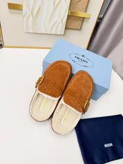 PRADA 26S SHEARLING-LINED MULES IN COGNAC BROWN SUEDE