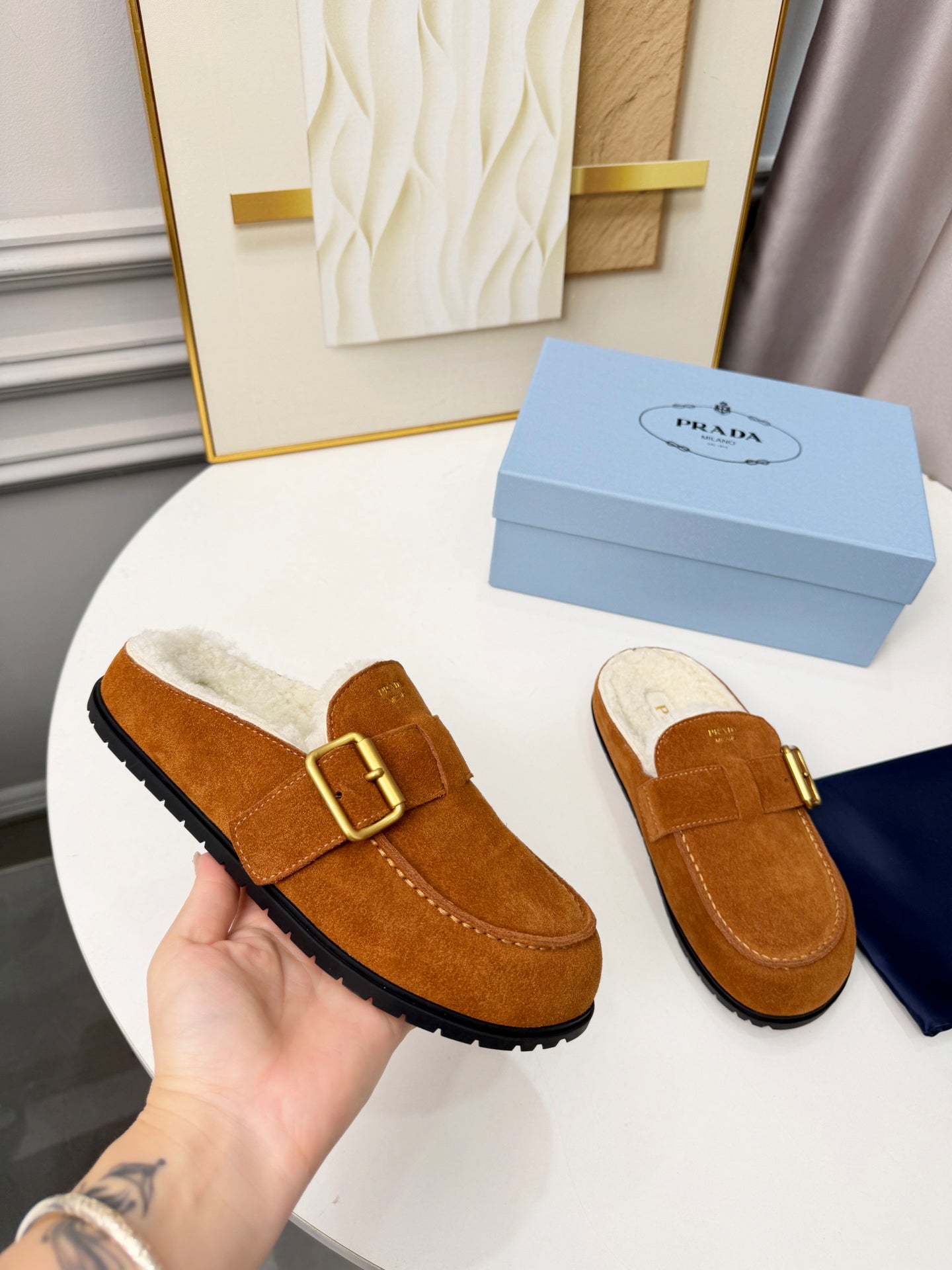 PRADA 26S SHEARLING-LINED MULES IN COGNAC BROWN SUEDE
