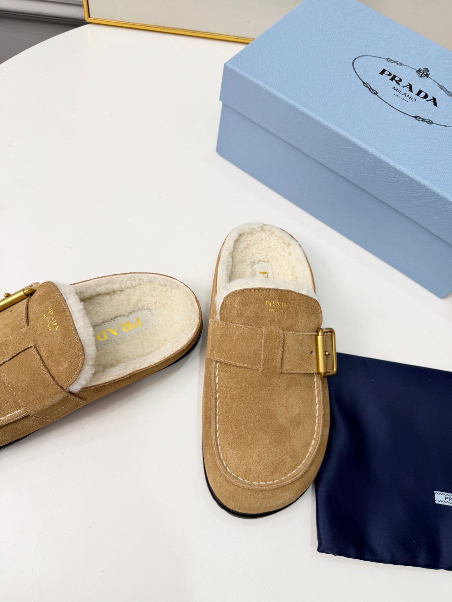 PRADA 26S SHEARLING-LINED MULES IN WARM BEIGE SUEDE