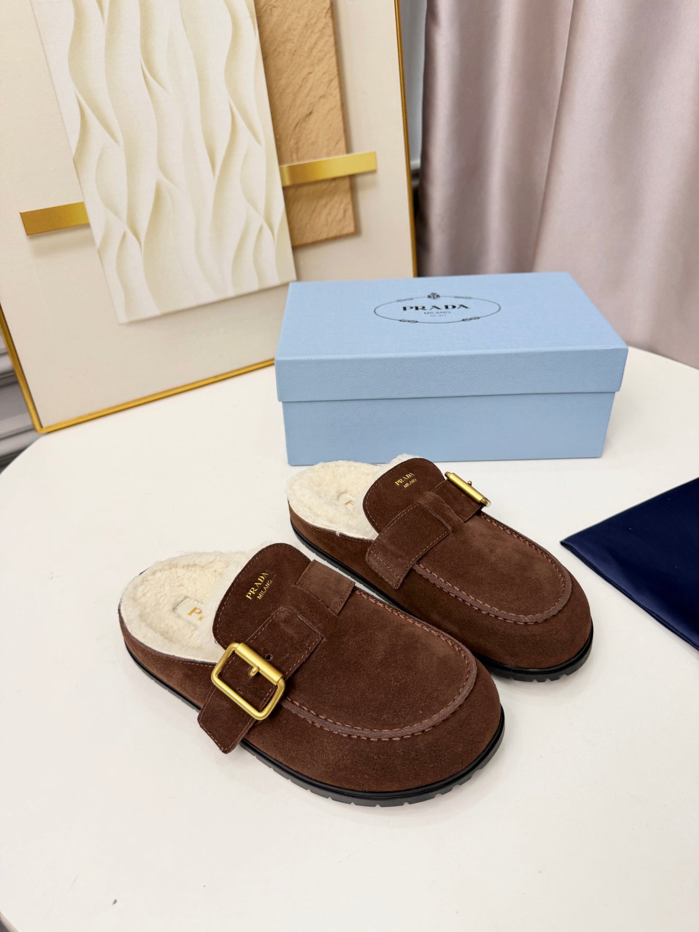 PRADA 26S SHEARLING-LINED MULES IN CHOCOLATE BROWN SUEDE