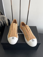CHANEL 26S LOW TOP BEIGE IN NAVY BLUE CANVAS