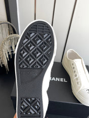 CHANEL 26S LOW TOP SNEAKERS IN WHITE CANVAS