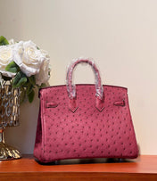 KELLY SELLIER 25 BAG IN CURRANT RED OSTRICH LEATHER WITH SILVER HARDWARE