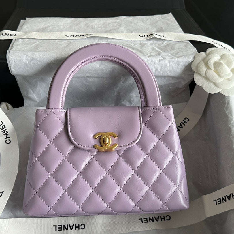 CHANEL VINTAGE KELLY 25S 19 CM IN PURPLE LAMBSKIN WITH GOLD HARDWARE