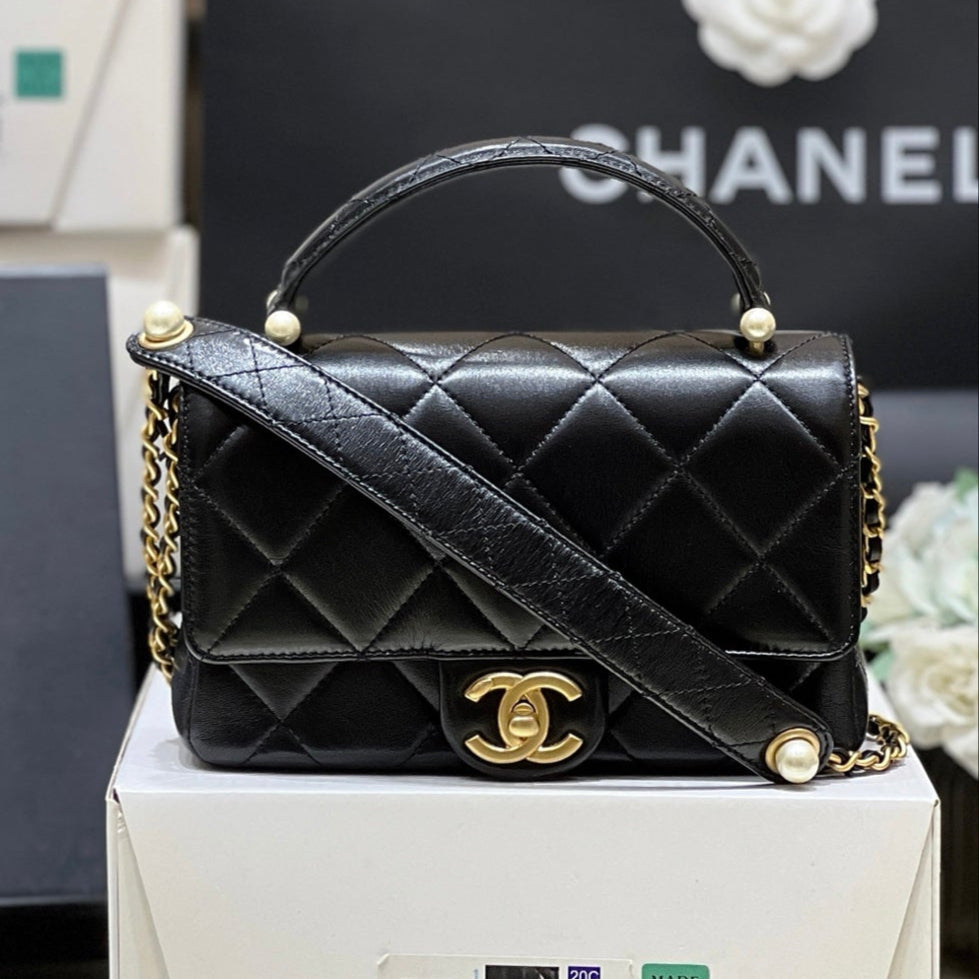 PEARL LIMITED EDITION FLAP BAG WITH HANDLE 20 IN BLACK LAMBSKIN
