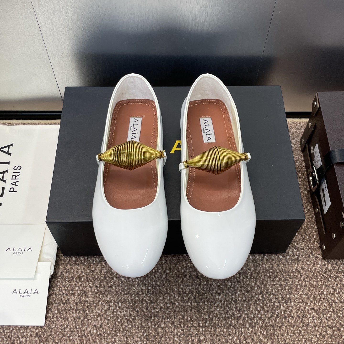 ALAIA BALLET SHOES 25S IN WHITE PATENT LEATHER WITH GOLD HARDWARE