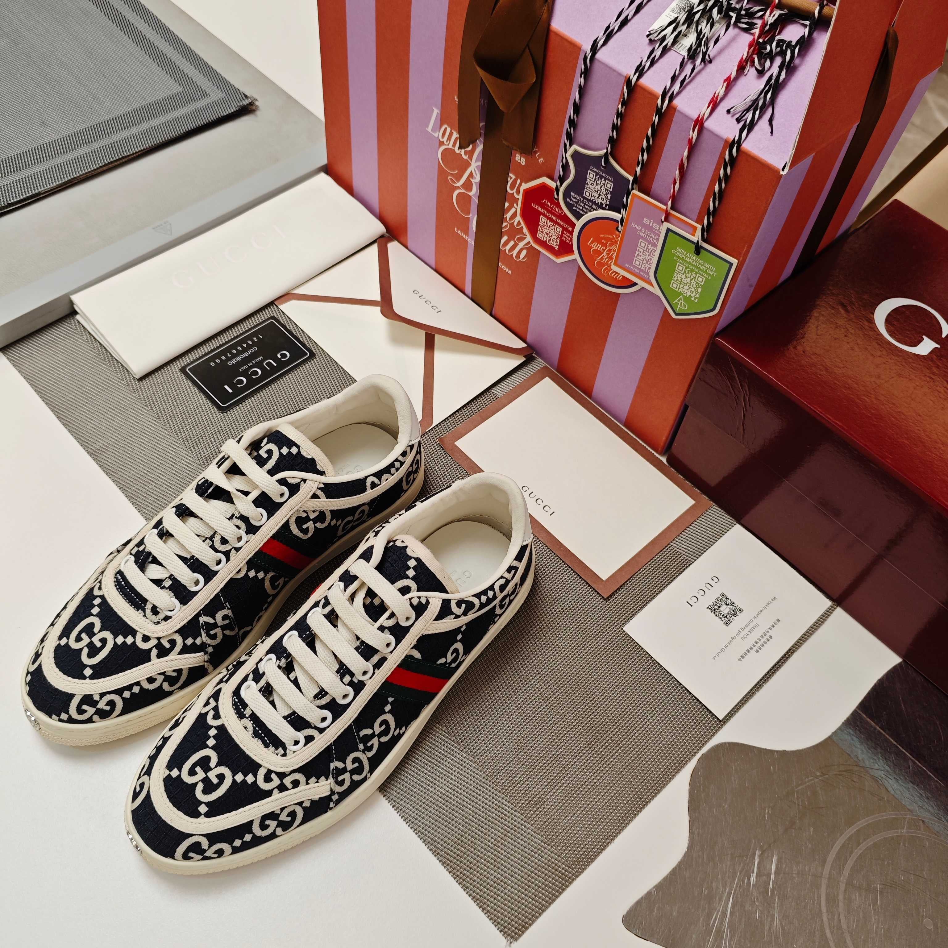 GUCCI 26S GG WEB SNEAKERS IN NAVY BLUE AND WHITE GG CANVAS