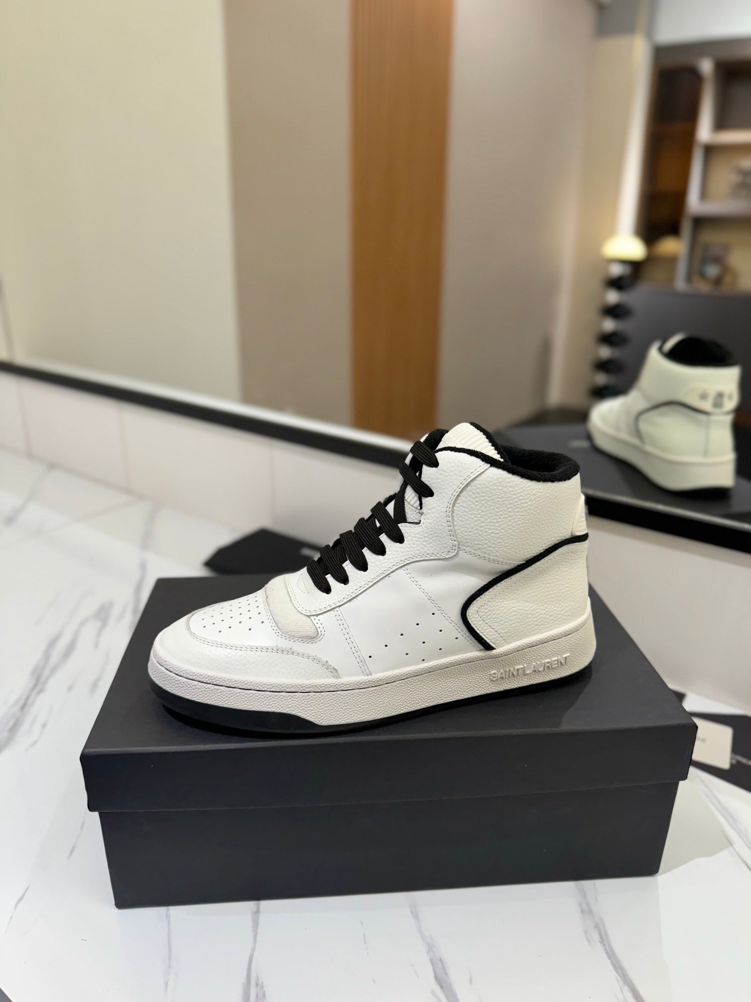MID-TOP SNEAKERS IN WHITE AND BLACK TRIM PERFORATED LAMBSKIN