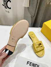 FENDI BAGUETTE SLIDES IN BRIGHT YELLOW LAMBSKIN