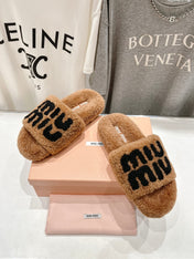 MIUMIU 26S SANDALS IN LIGHT BROWN SHEARLING WITH LOGO LETTERING