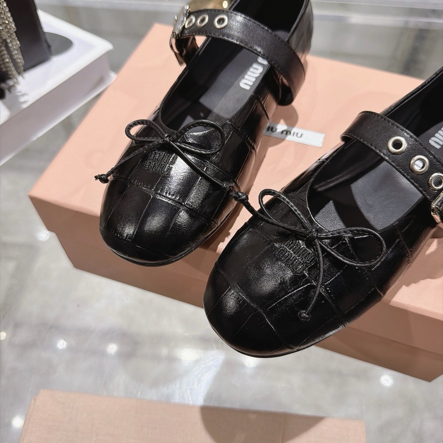 MIUMIU 26S MARY JANE FLATS IN BLACK CROC-EMBOSSED LEATHER